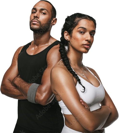 Two athletic adults stand back-to-back with arms crossed, posing in workout attire in a studio.